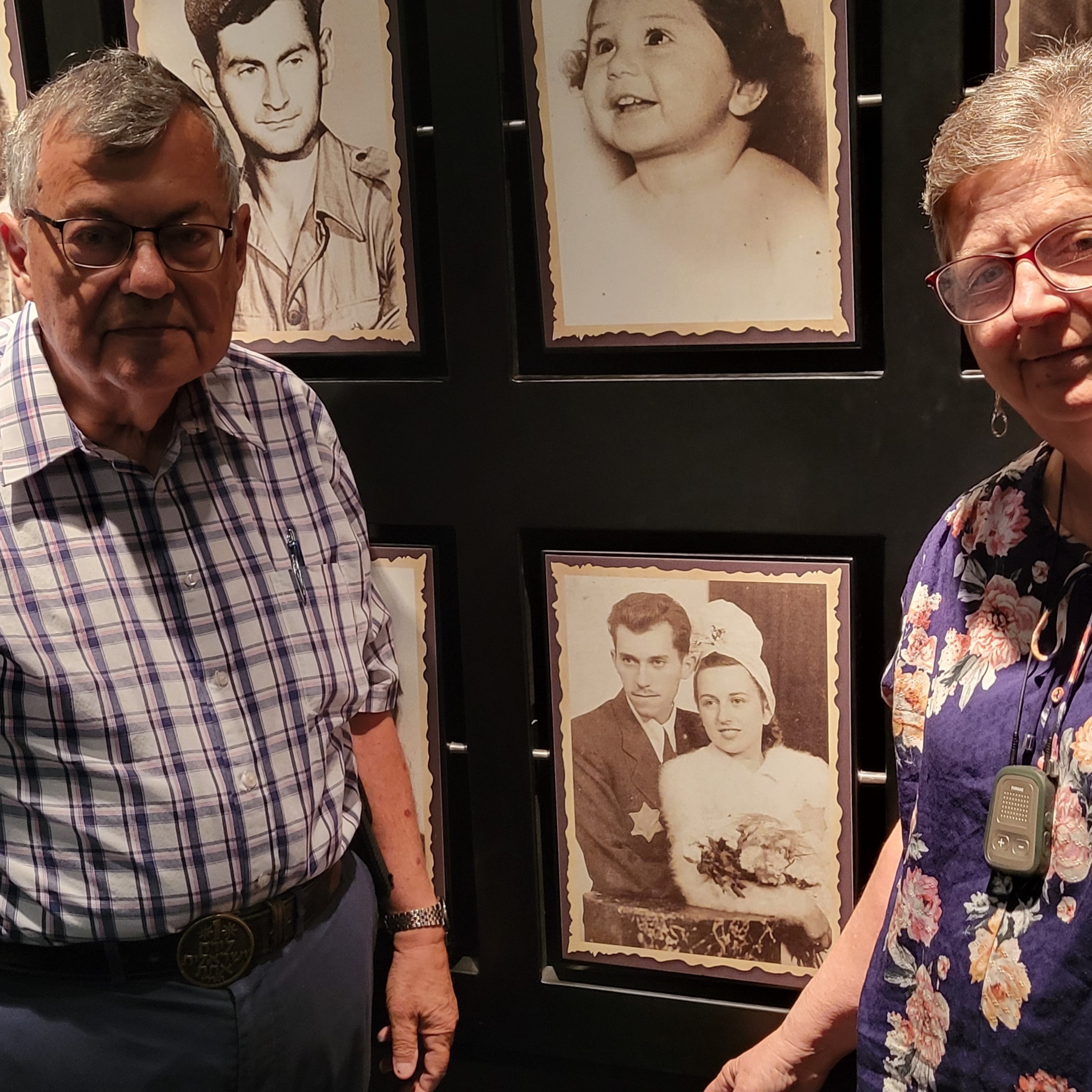 George Lebovitz and Shari Baellow by their parents' wedding picture on display at The Testimony House in Nir Galim, Israel.